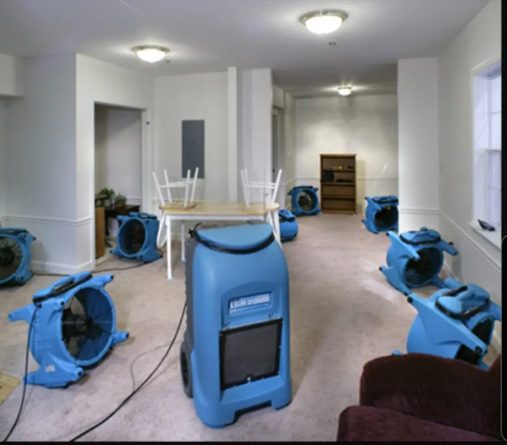 Air movers and dehumidifier setup for Water Damage Restoration in Pembroke
